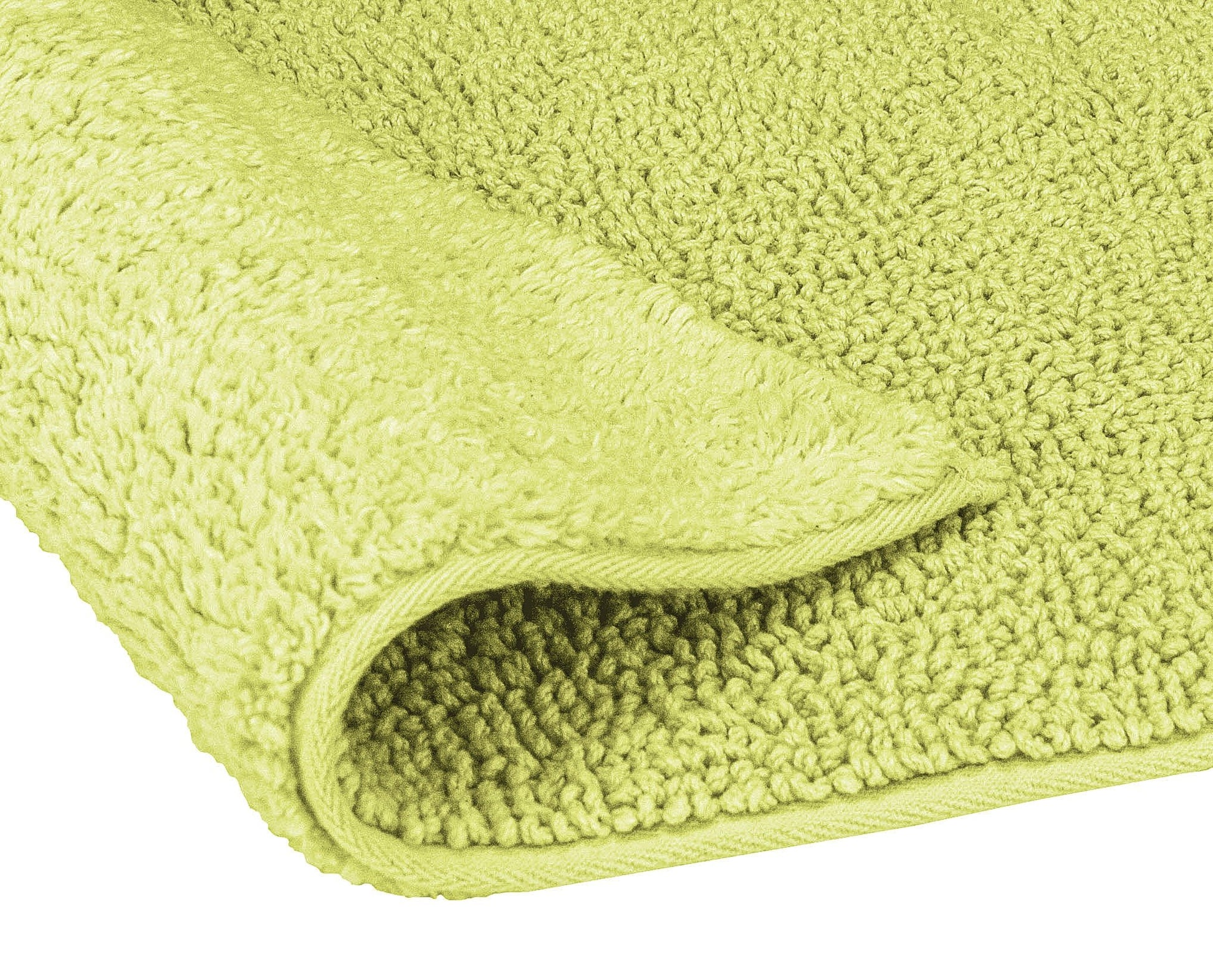 Badteppich CHRISSY Palme 65 x 115 cm in Nahaufnahme mit weicher, grün strukturierter Oberfläche.