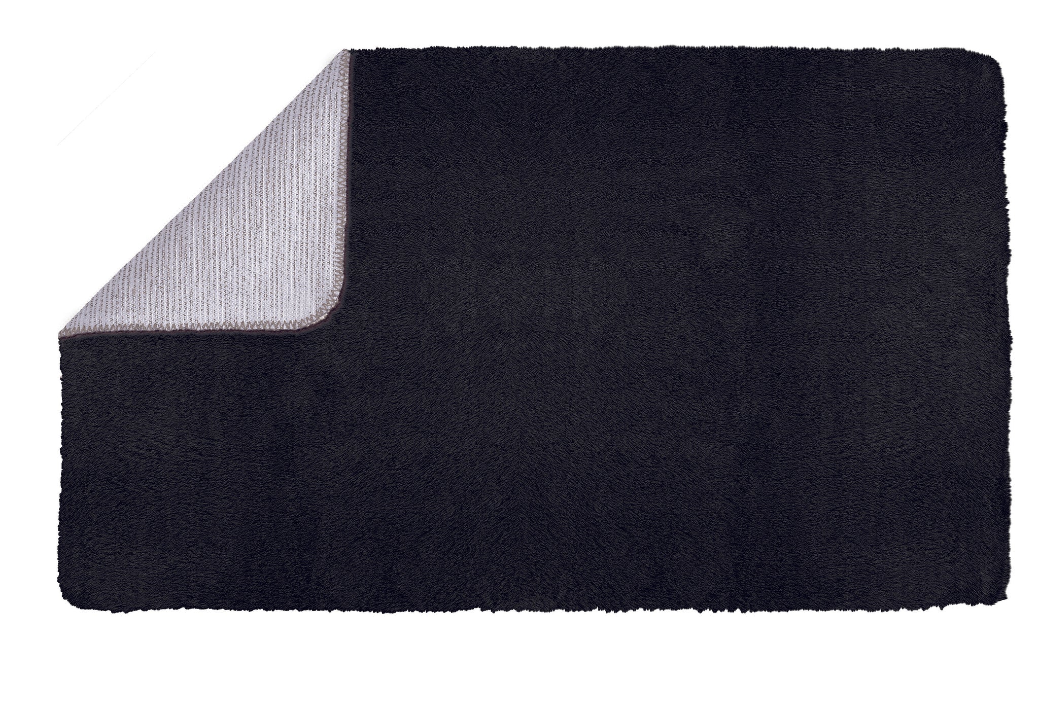 Rechteckige schwarze Badematte mit umgeschlagener hellgrauer Ecke