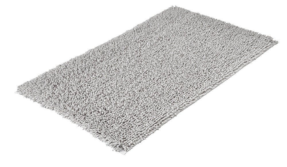 Badteppich DANA seidenfarben 60 x 100 cm liegt als rechteckiger Teppich auf weißem Hintergrund.