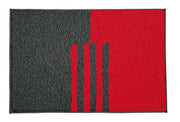 Badteppich DYNAMIC Rubin 60 x 90 cm liegt flach mit grau-rotem Design auf dem Boden.