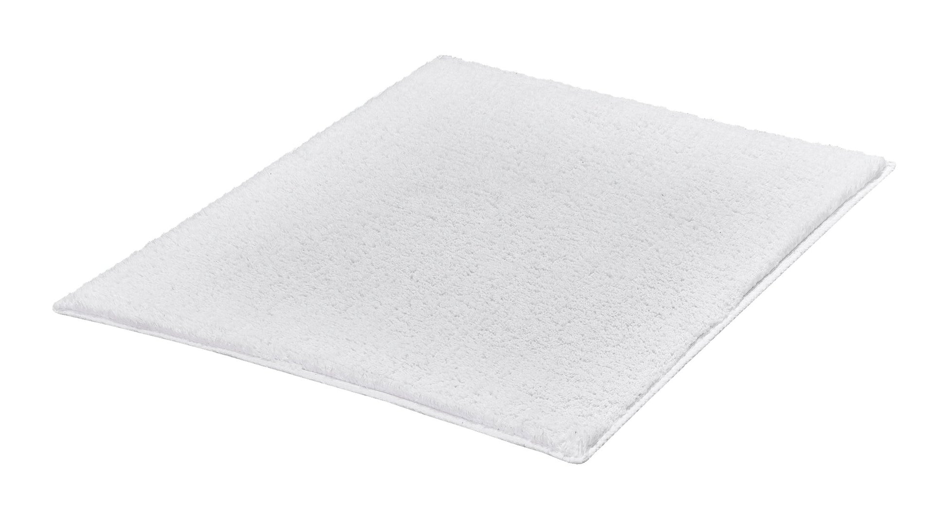 Weiße, rechteckige Badematte mit flauschiger, weicher Oberfläche