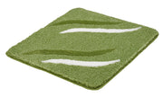 Grüne rechteckige Badematte mit weißen und dunklen Wellenmustern