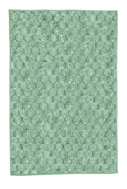 Mintgrüner Badteppich mit flauschigem Wabenmuster.