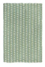 Rechteckige, grün gemusterte Badematte mit gelben und weißen Streifen