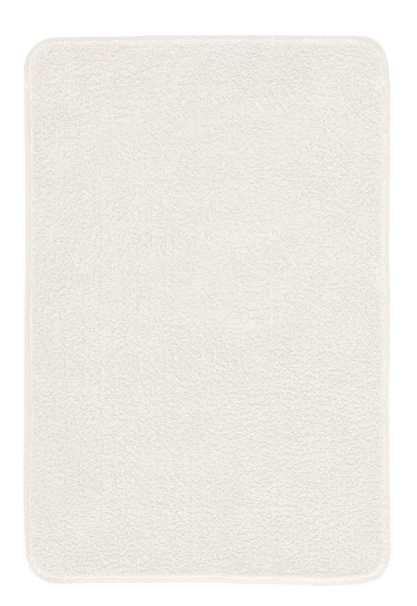 Der weiße Badteppich MARCO 70 x 120 cm liegt rechteckig und flauschig auf dem Boden.