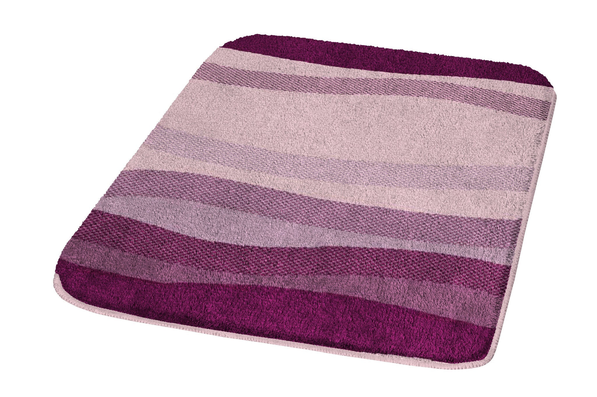 Badteppich MIAMI Beere 60 x 90 cm liegt mit welligen Streifenmustern auf dem Boden.