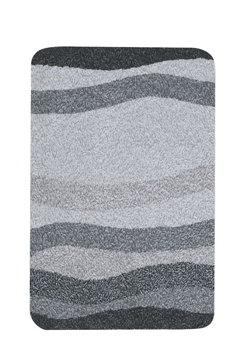 Badteppich MIAMI Schiefer 60 x 90 cm mit welligem Muster in Grautönen von oben gesehen.