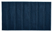 Dunkelblauer rechteckiger Badevorleger mit strukturierten Streifen