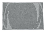 Badteppich MYSTIC Anthrazit 80 x 140 cm liegt rechteckig mit abstraktem Muster auf hellem Untergrund.