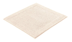 Quadratische cremefarbene Badematte mit breitem Struktur-Rand weich