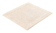 Quadratische cremefarbene Badematte mit breitem Struktur-Rand weich