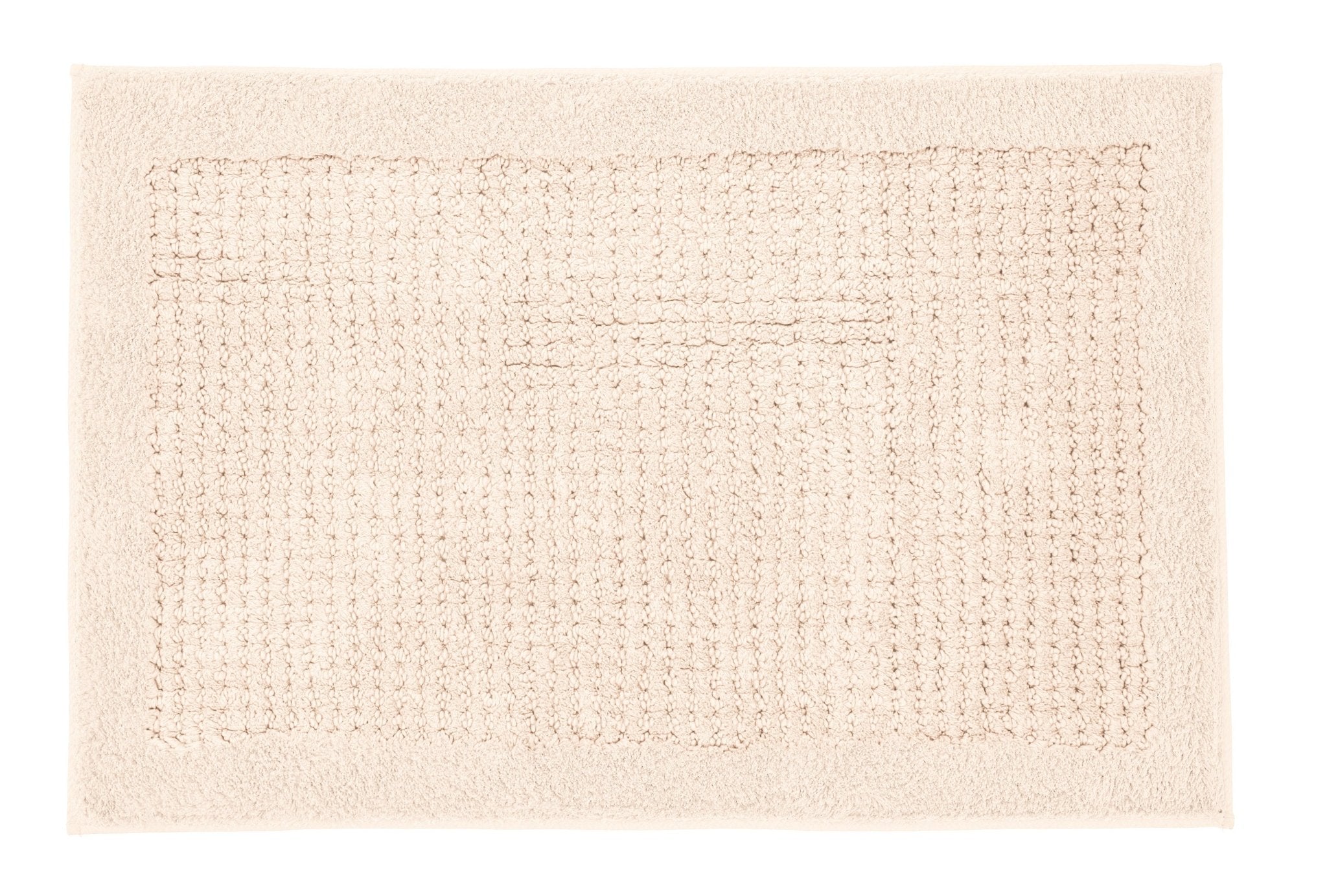 Badteppich NET Natur 80 x 140 cm liegt flach und zeigt seine strukturierte Oberfläche.