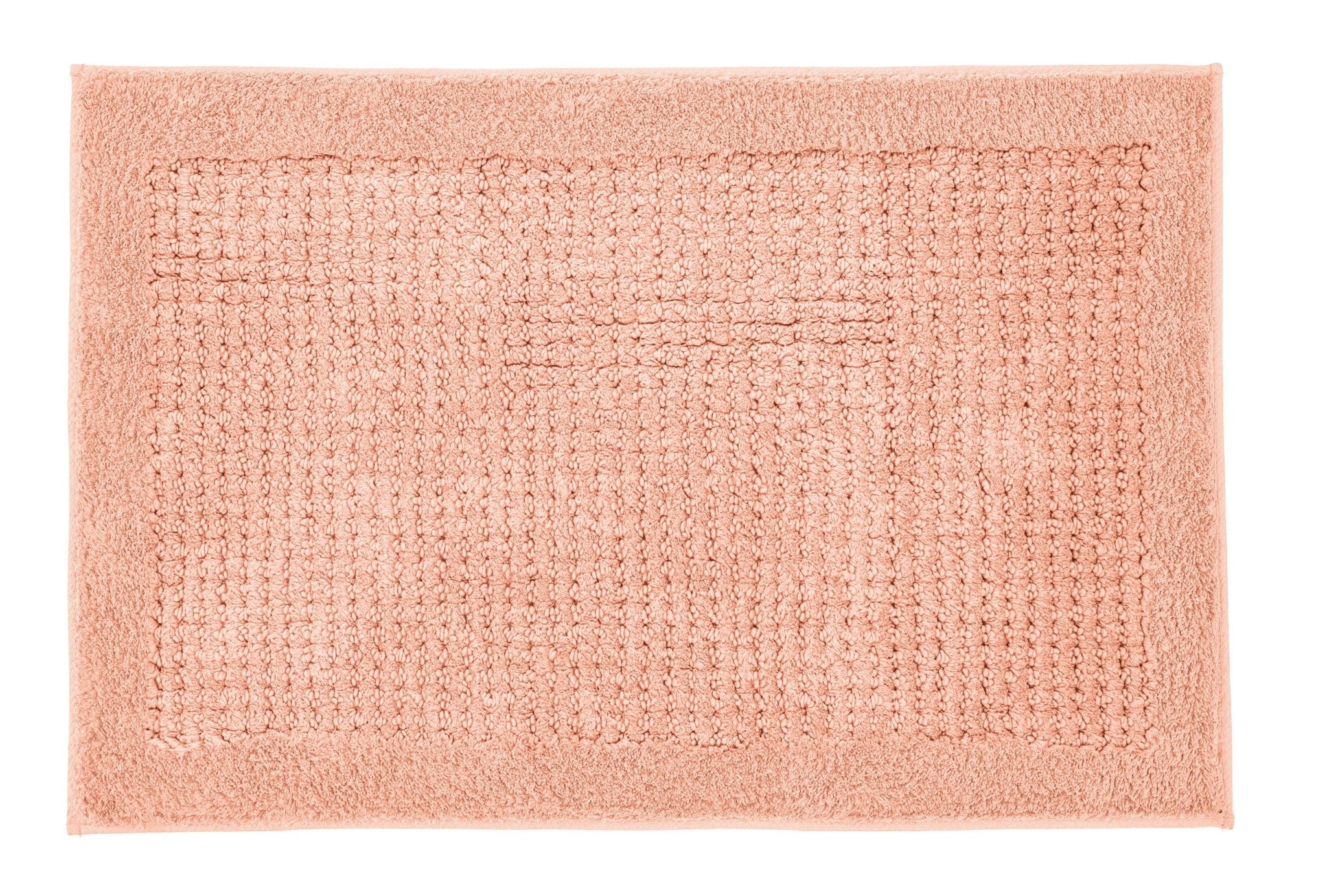 Badteppich NET Papaya 70 x 120 cm liegt flach und zeigt seine strukturierte Oberfläche.