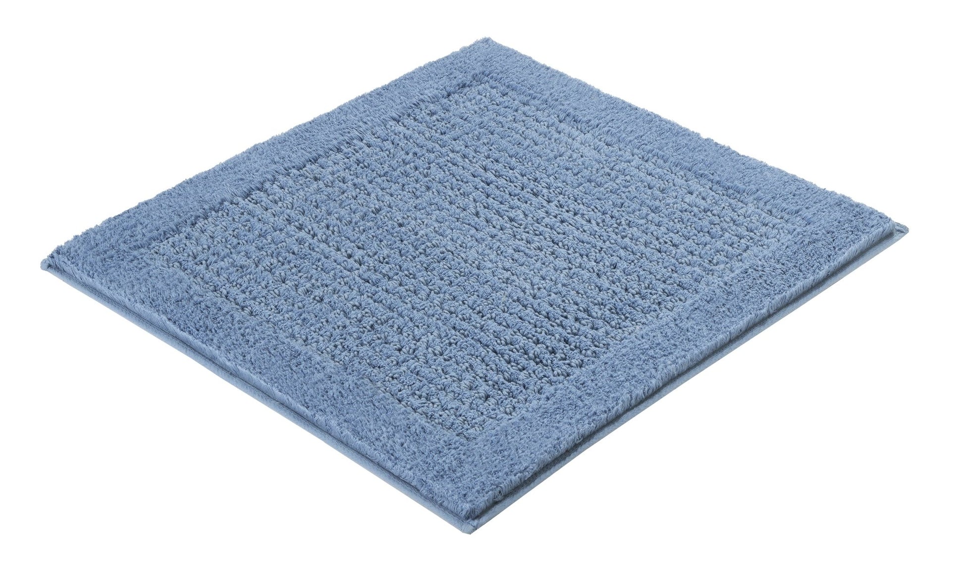 Badteppich NET in Stahlblau mit Struktur, quadratisch, teilweise von oben gezeigt.