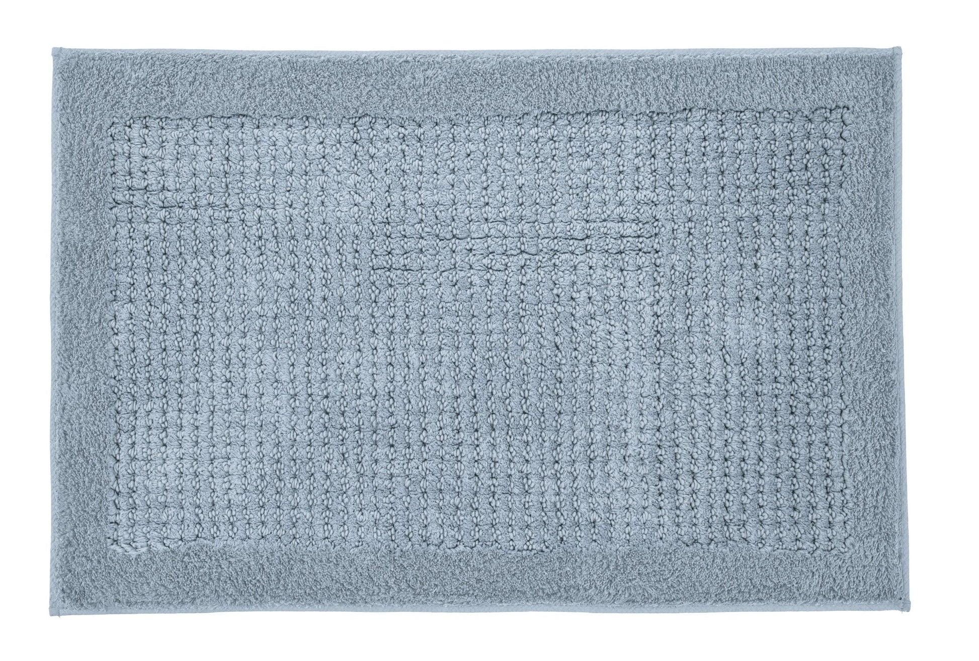Badteppich NET in Stahlblau 80 x 140 cm liegt flach und vollständig sichtbar auf hellem Untergrund.