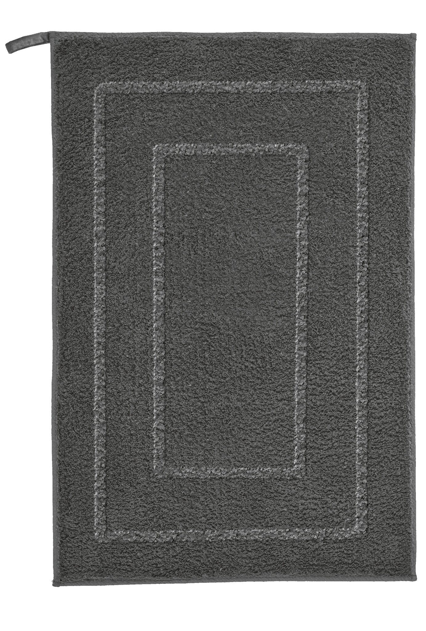 Der anthrazitfarbene Badteppich NICO 50 x 60 cm liegt rechteckig auf dem Boden.