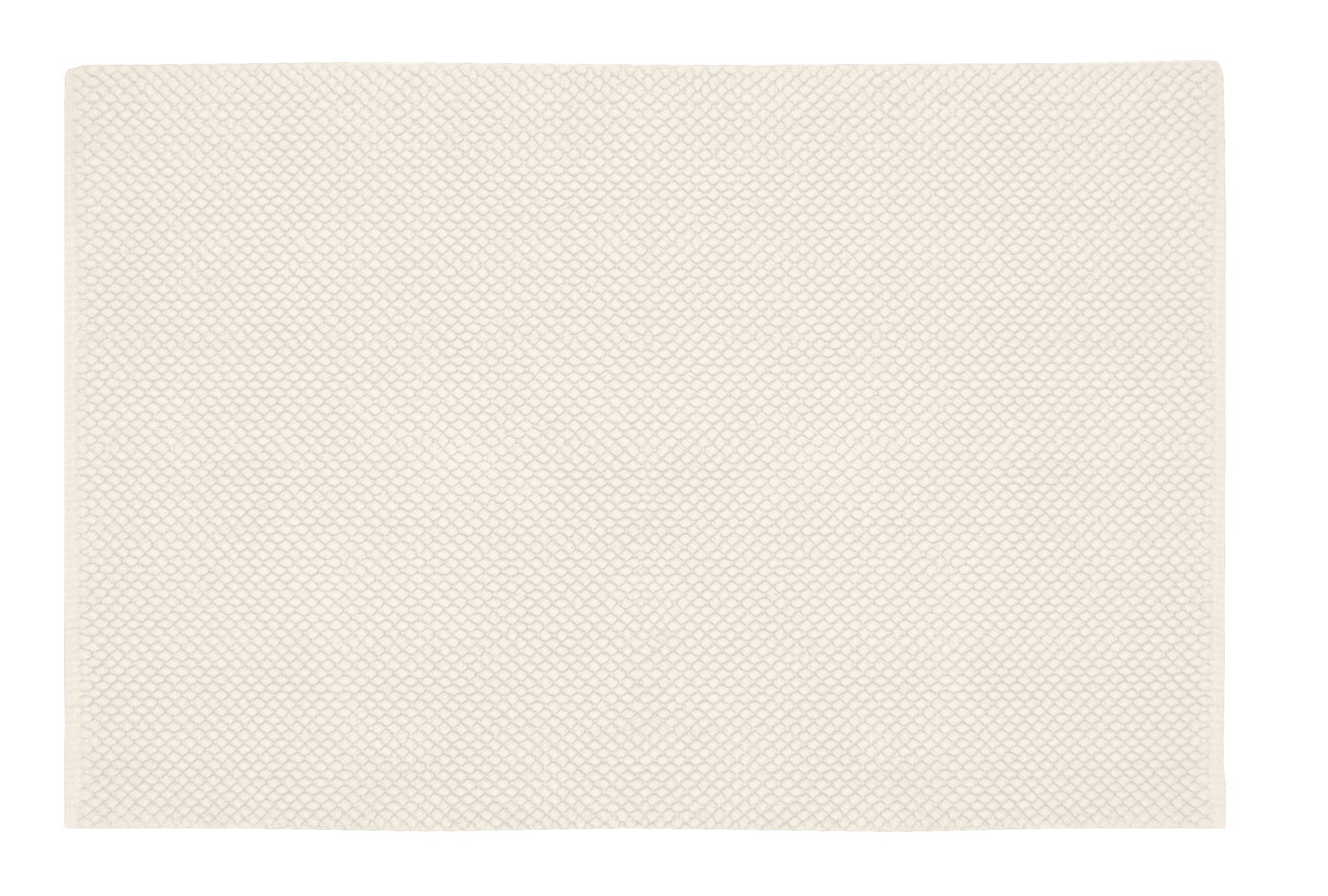 Cremefarbene Badematte mit feiner Wabenstruktur in Draufsicht von oben