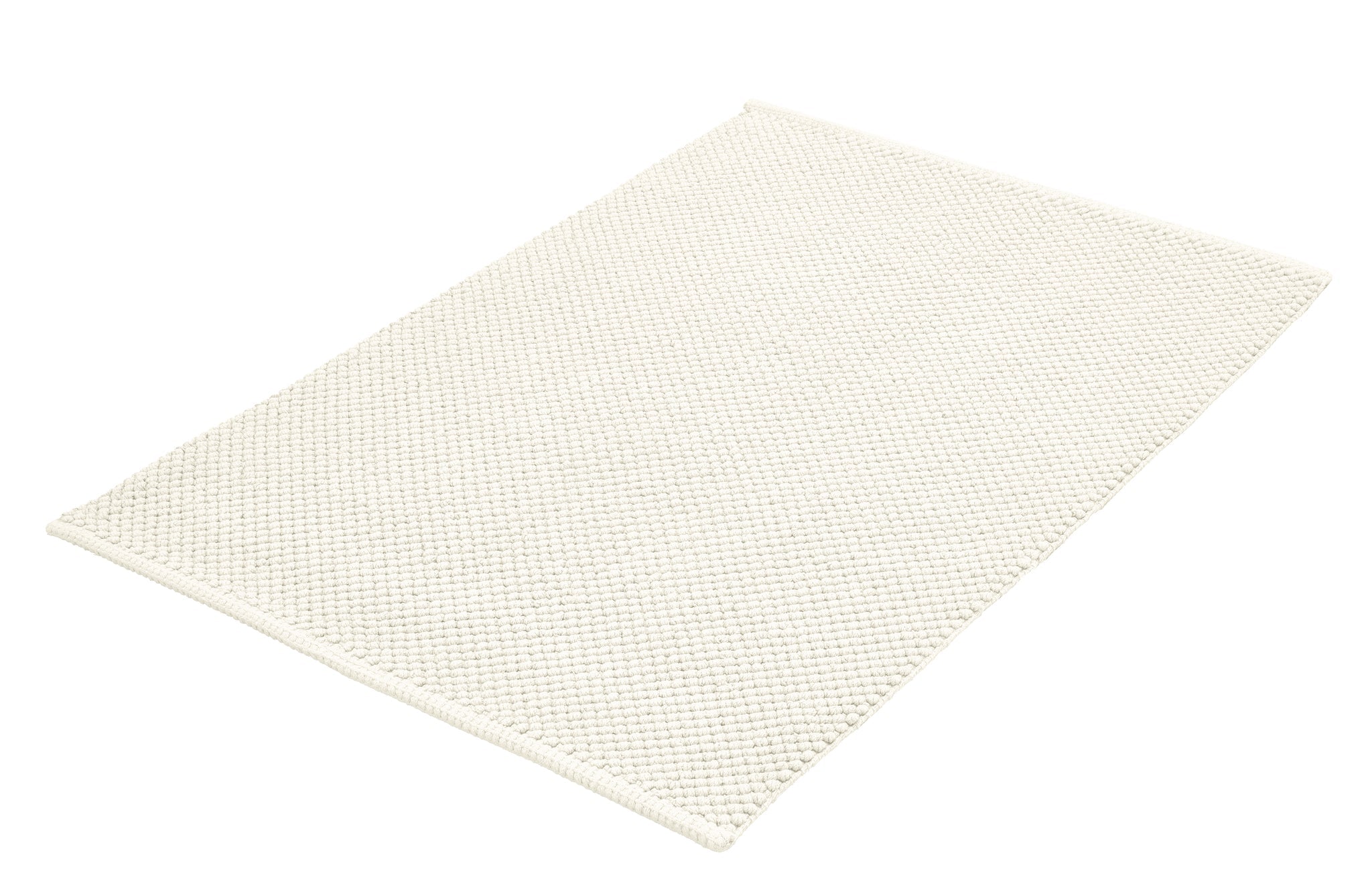 Rechteckige cremeweiße Badematte mit dichter, strukturierter Oberfläche