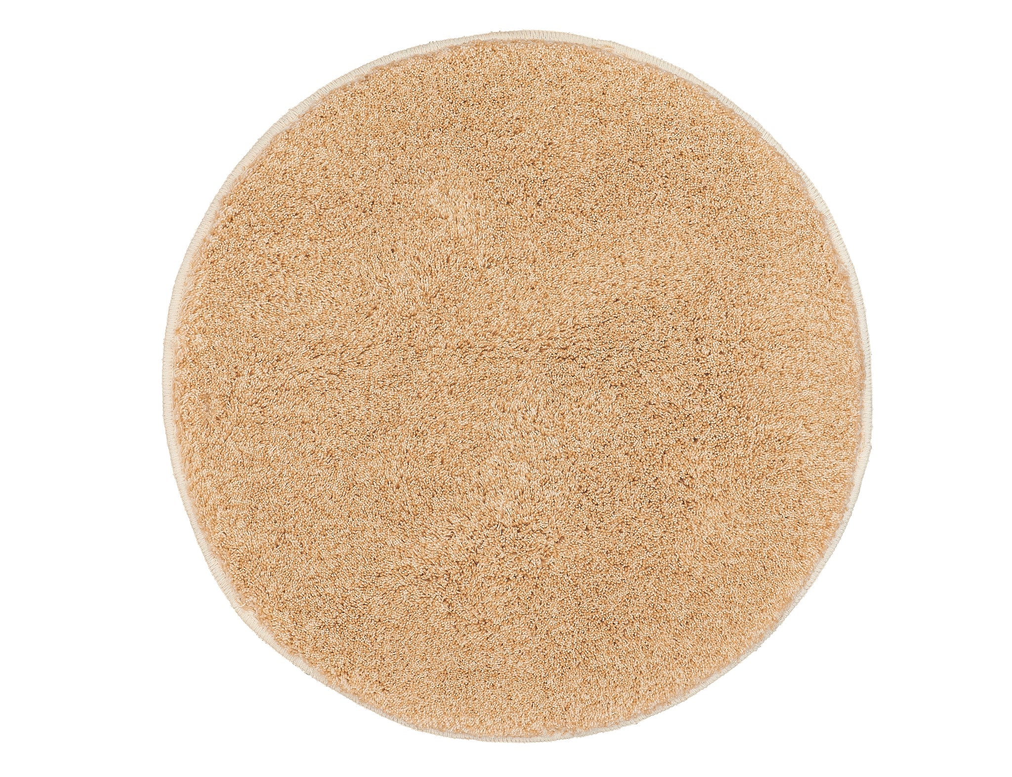 Runder Badteppich RELAX in Champagner mit 100 cm Durchmesser liegt auf hellem Untergrund.