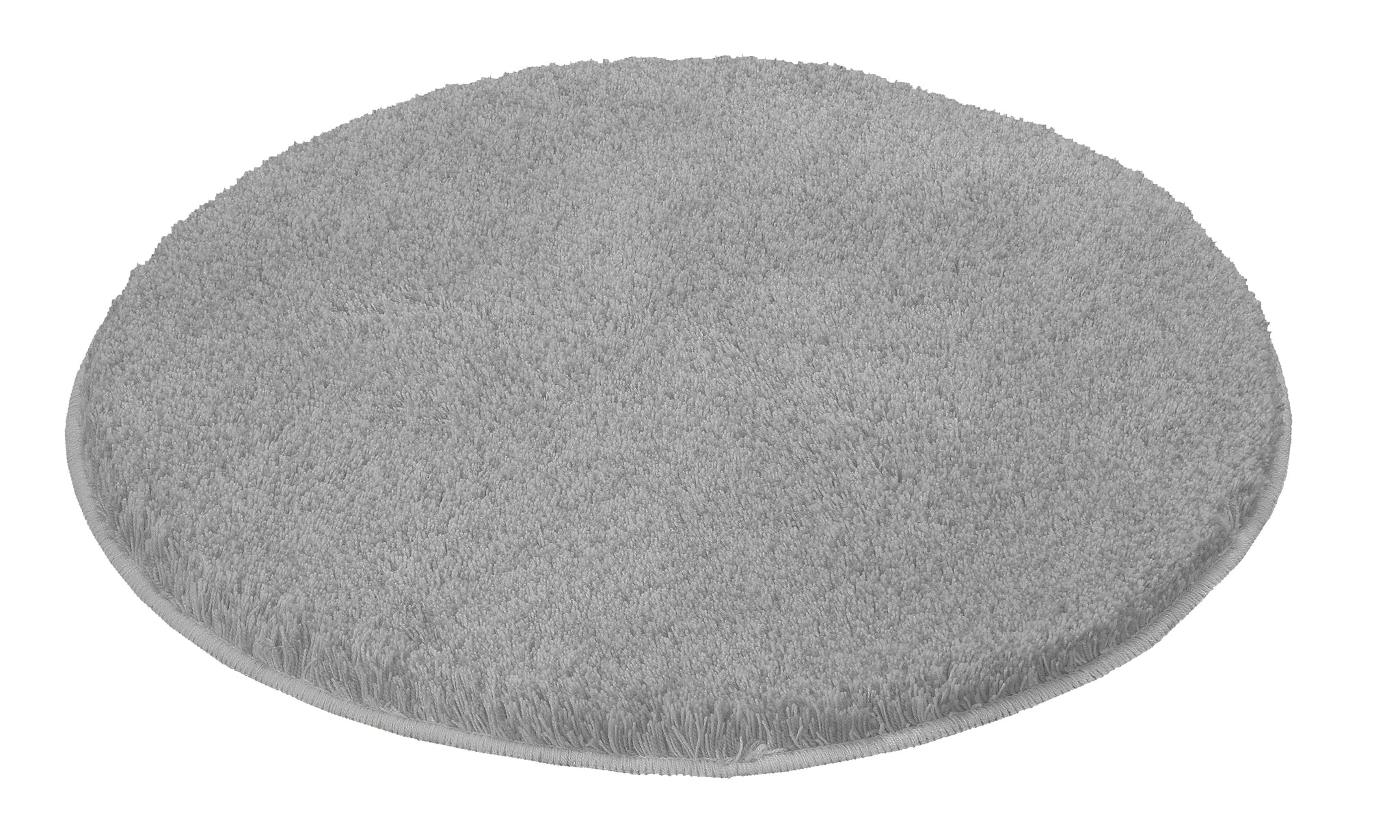 Runder Badteppich RELAX Grau mit weicher Oberfläche liegt auf einem hellen Untergrund.
