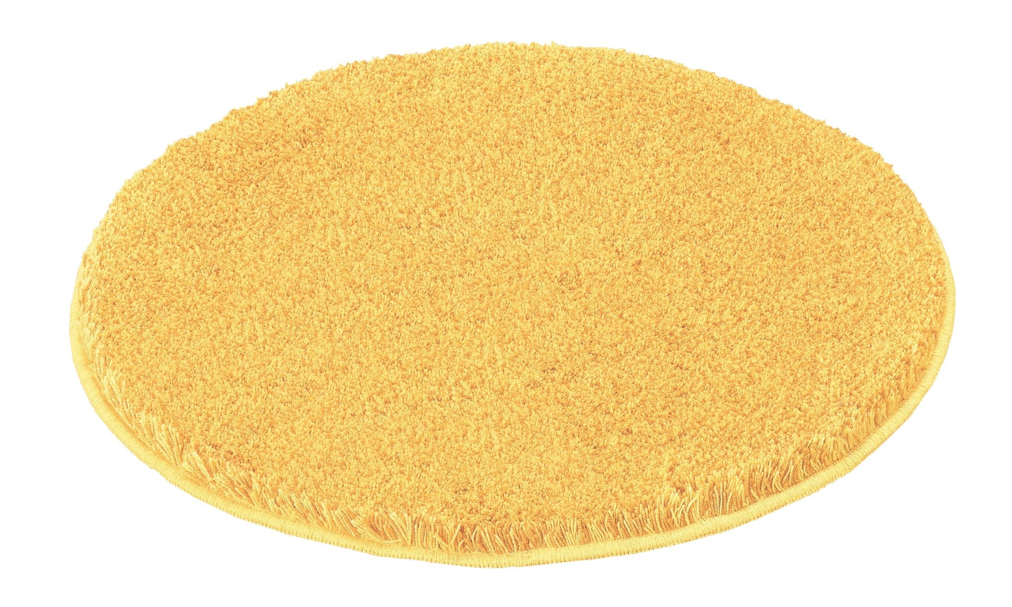 Runder Badteppich RELAX Mimose 100 cm liegt flach und zeigt seine weiche, gelbe Oberfläche.