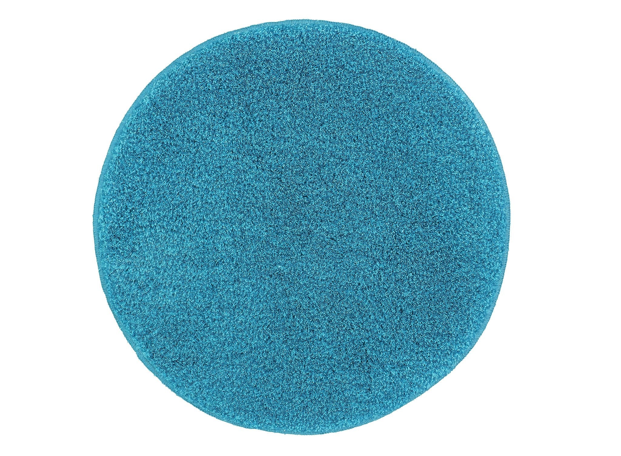 Runder Badteppich RELAX Pazifik 100 cm in kräftigem Türkis liegt flach auf hellem Untergrund.