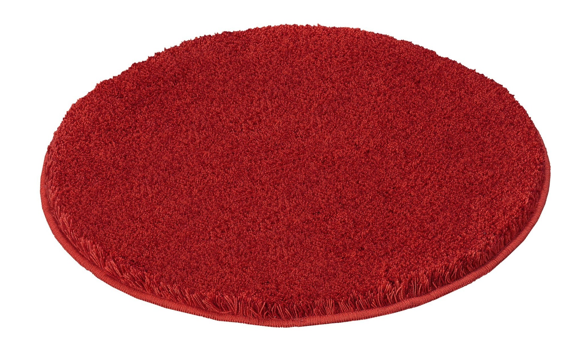 Runder Badteppich RELAX Rubin 100 cm in kräftigem Rot liegt flach auf hellem Untergrund.