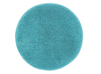 Runder, flauschiger Badteppich in kräftigem Türkis, oben fotografiert