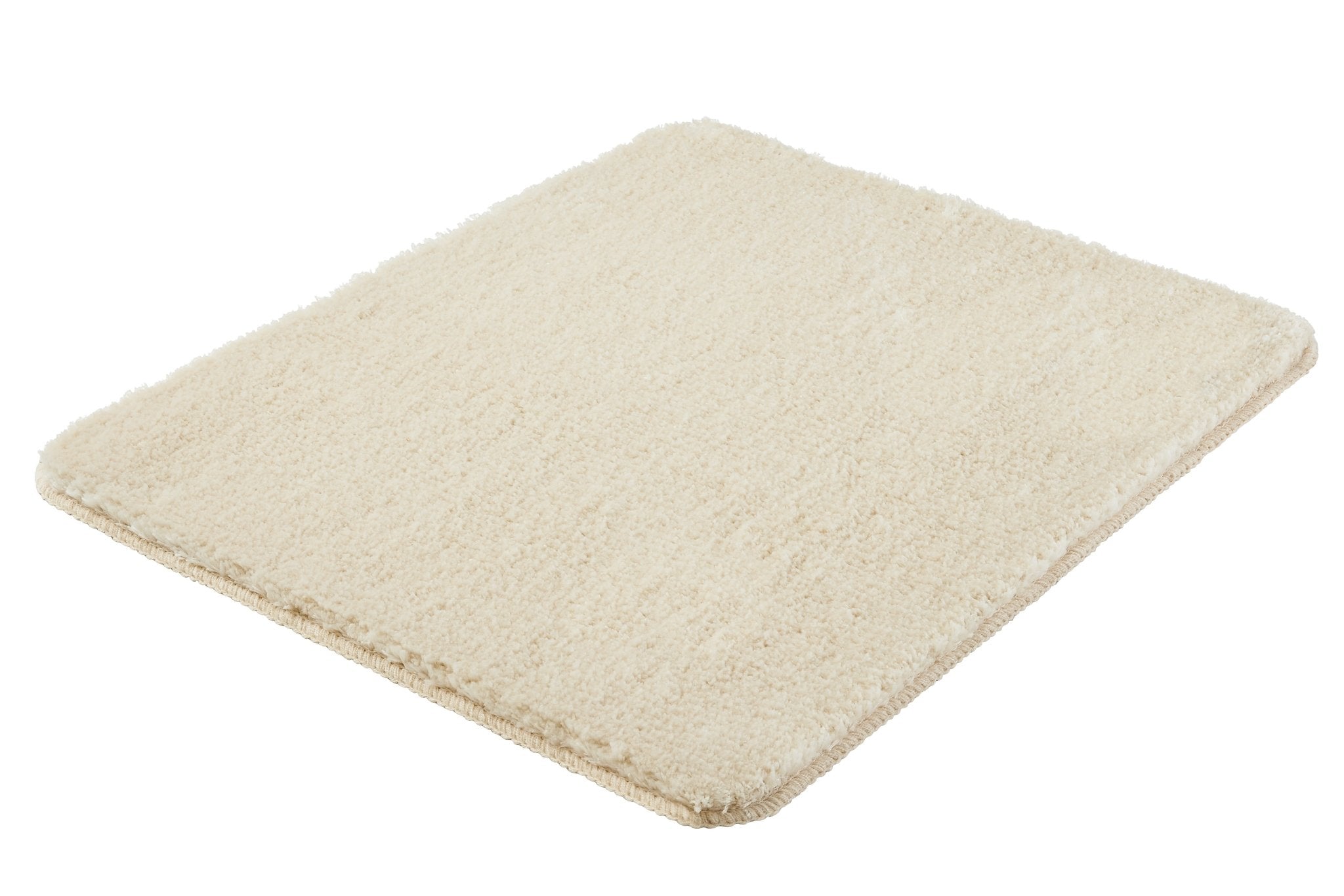 Rechteckige, cremefarbene Badematte mit dichtem, flauschigem Flor