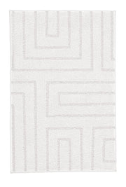 Weißer Badteppich mit geometrischem Linienmuster.