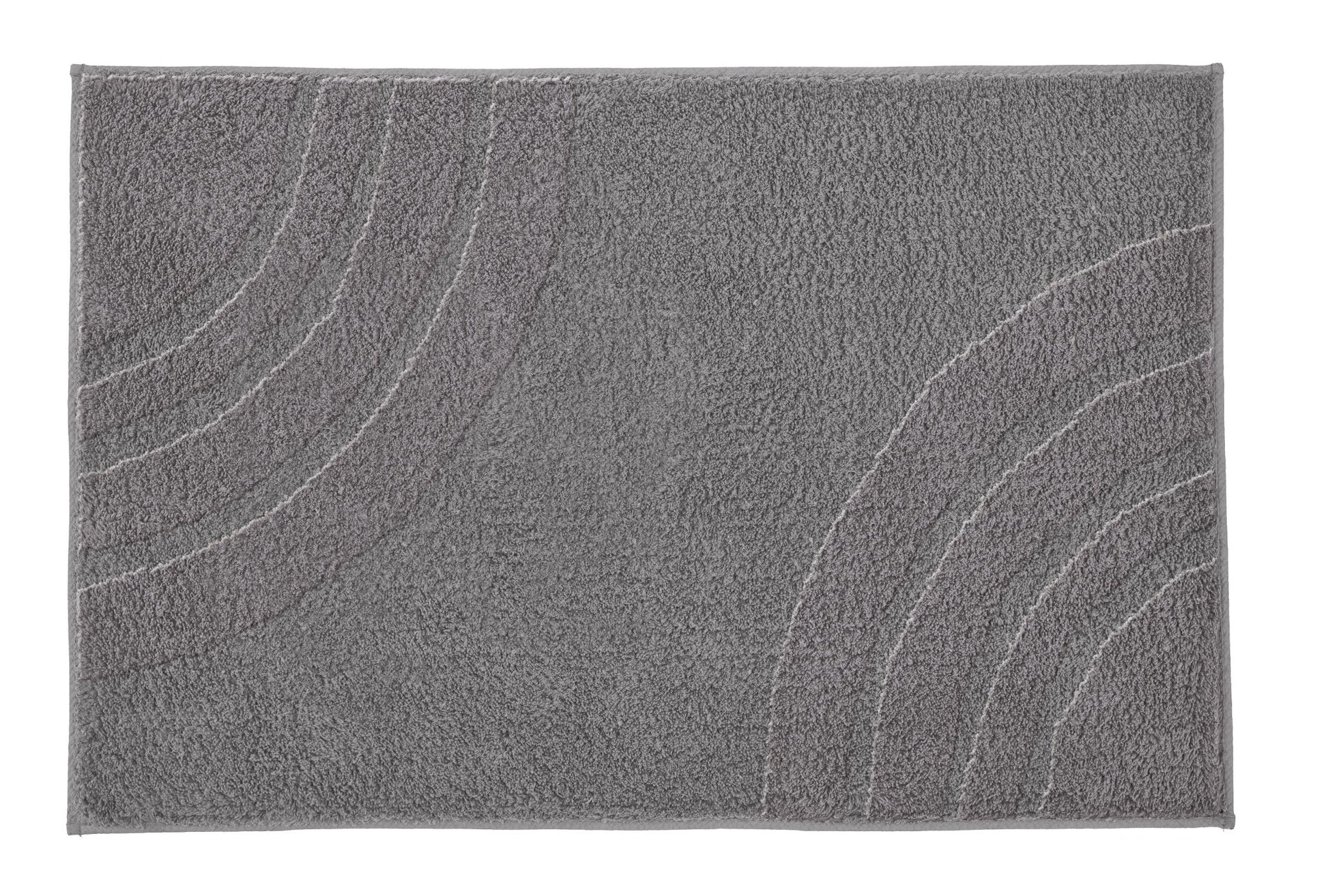Badteppich SATURN in Anthrazit, 60 x 100 cm, mit dezentem Bogenmuster ist flach ausgelegt zu sehen.