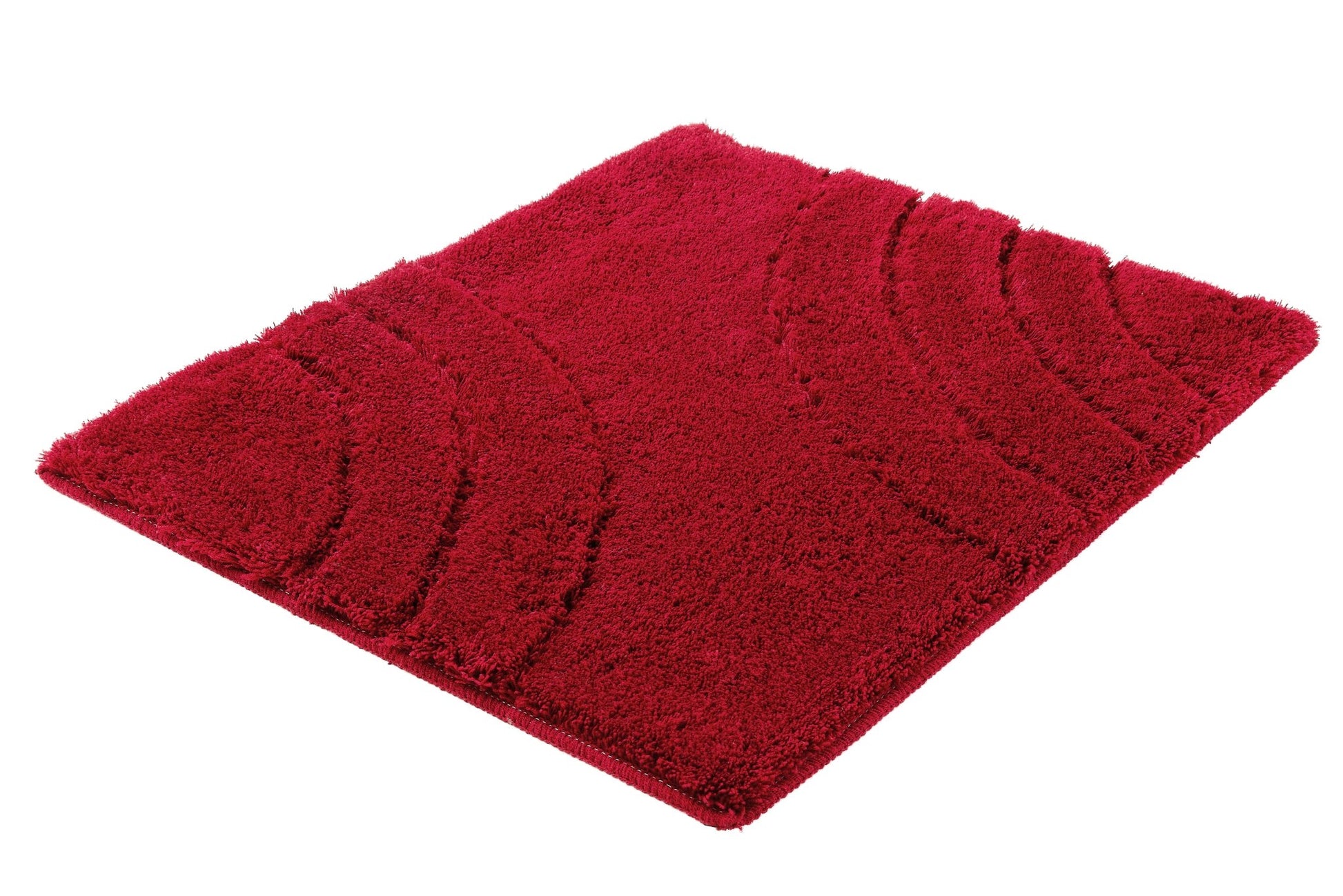 Roter Badteppich SATURN Granat 55 x 65 cm liegt flach mit sichtbarer Struktur auf hellem Untergrund.