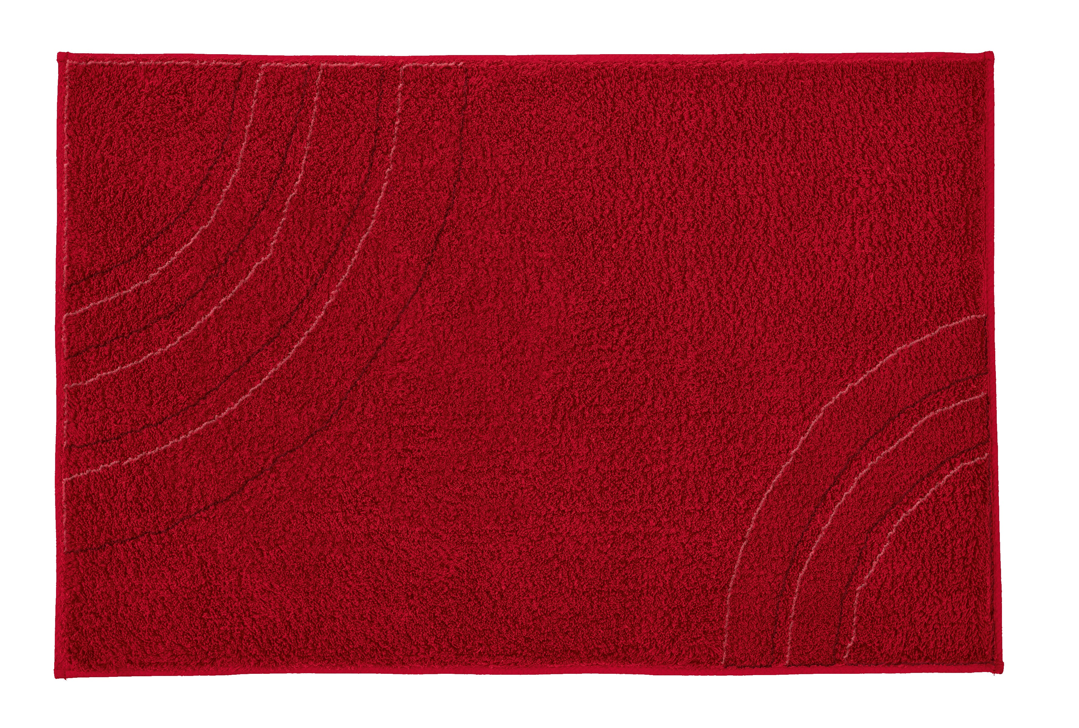 Rote Badematte mit dezentem Bogenmuster auf flauschiger Oberfläche