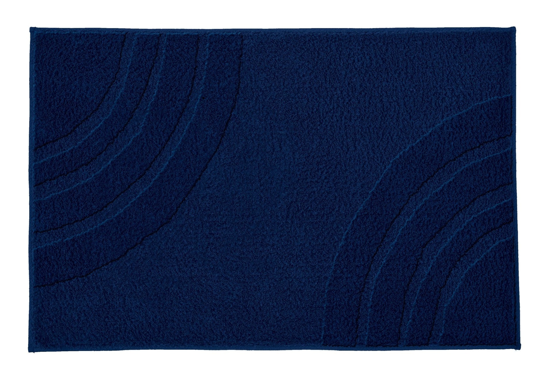 Badteppich SATURN in Navy mit dezentem Bogenmuster liegt flach auf hellem Untergrund.