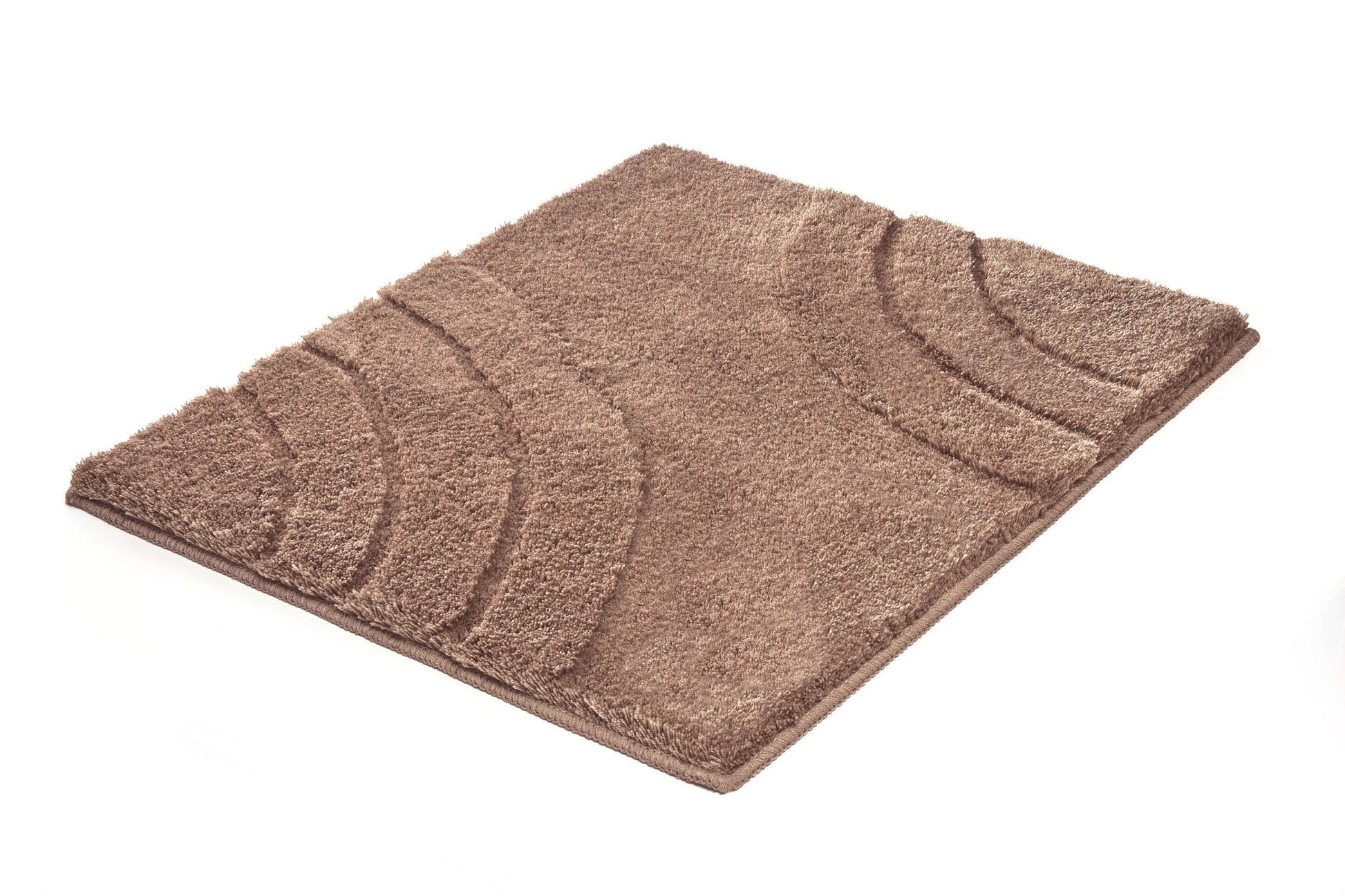 Badteppich SATURN Taupe 55 x 65 cm liegt flach und zeigt geprägte Bogenstruktur.