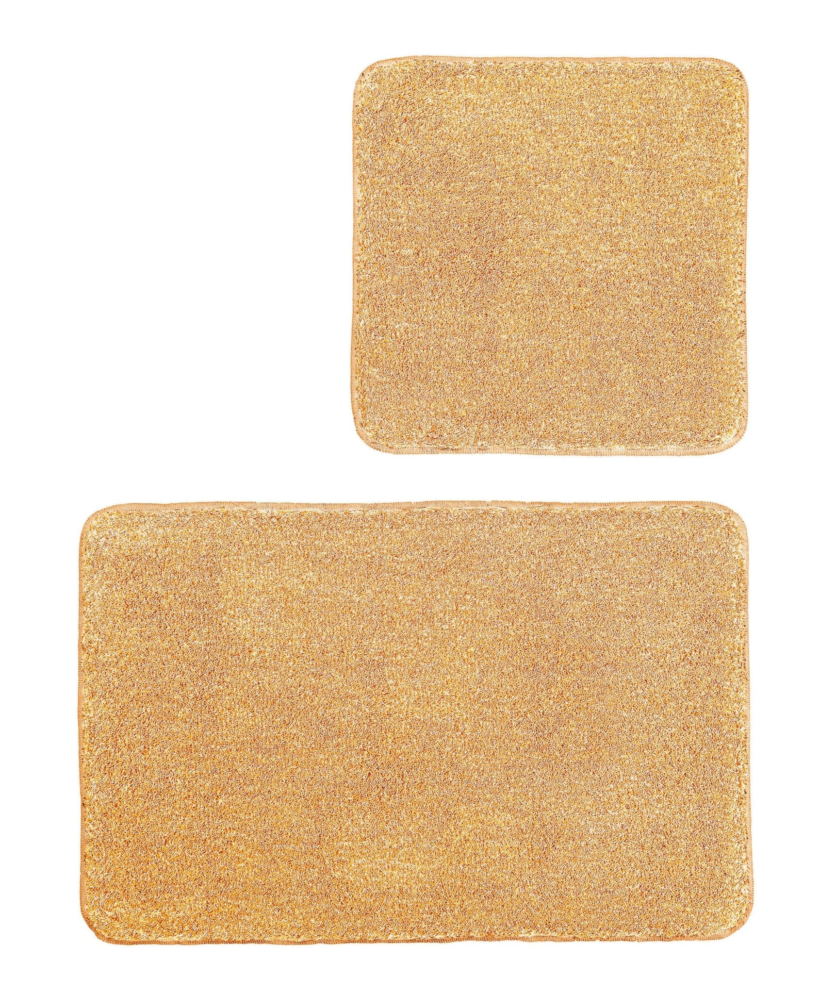 Badteppich-Set RELAX Peach mit zwei Teppichen in 50x50 cm und 55x85 cm liegt nebeneinander.