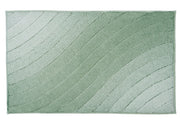 Rechteckiger hellgrüner Badteppich mit sanft geschwungenem Linienmuster