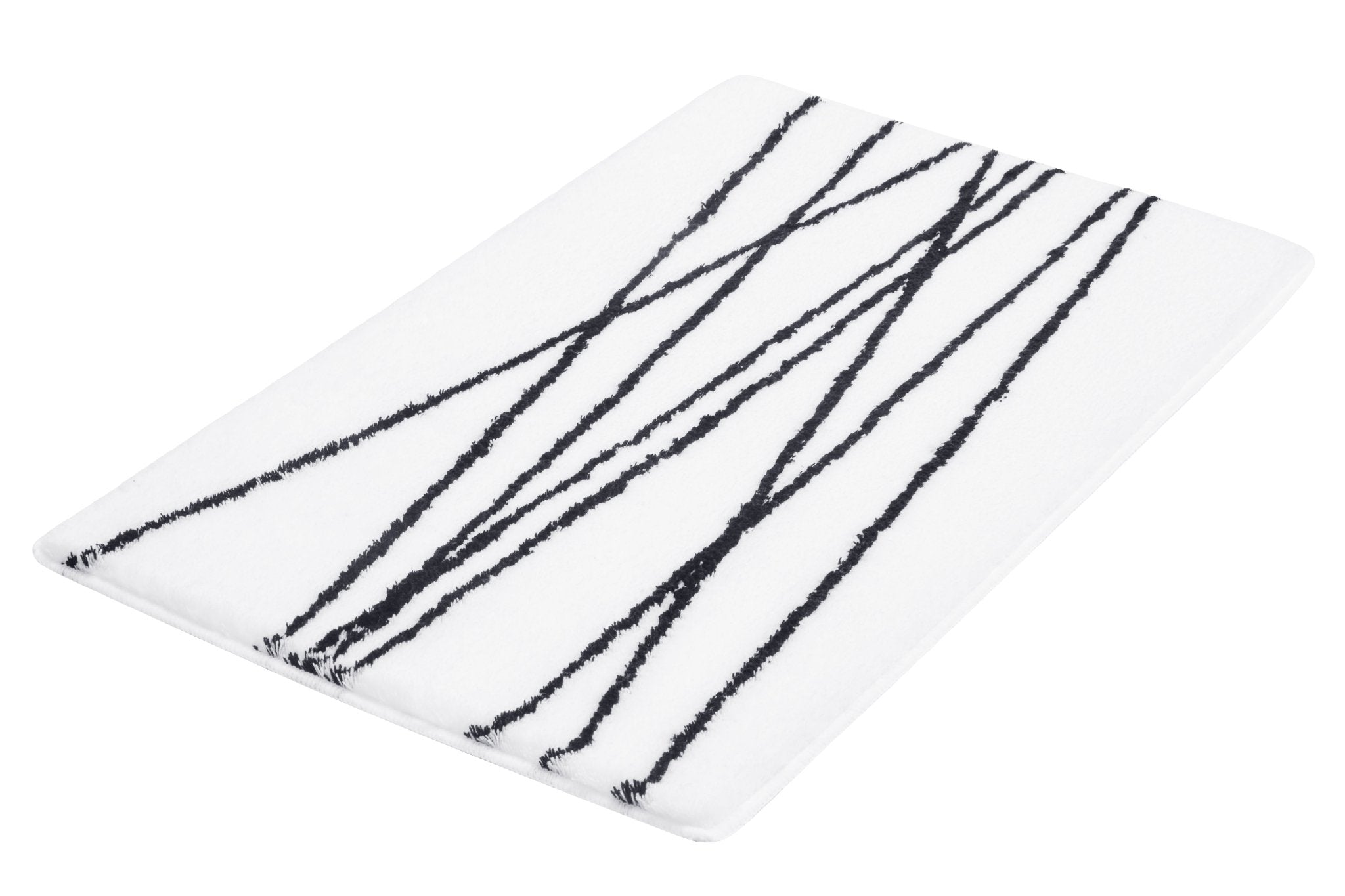 Weiße Badematte mit schwarzen, schräg verlaufenden Linienmuster als Dekor