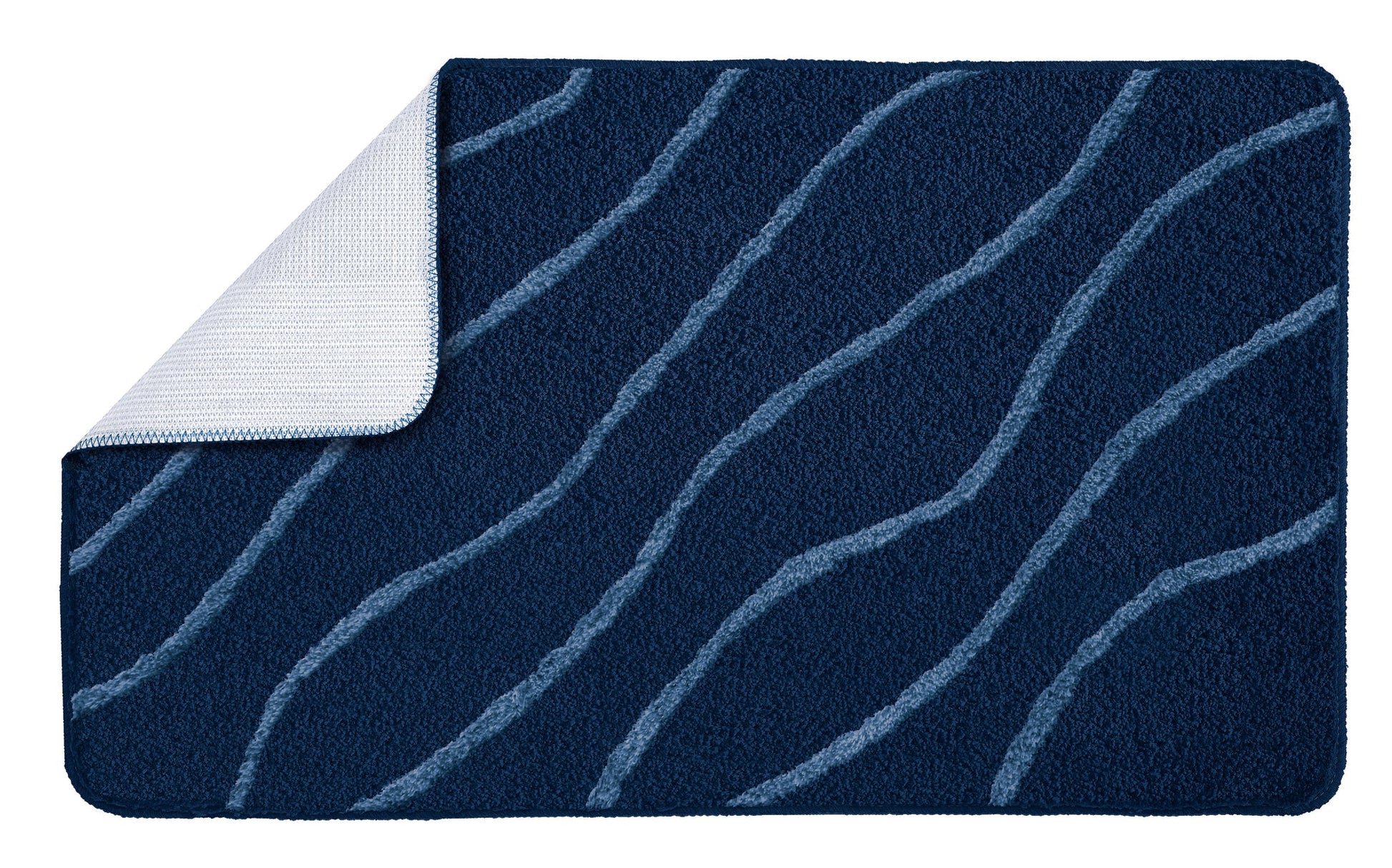 Badteppich TRAM Mare 55 x 65 cm in Dunkelblau mit hellblauen Wellen liegt flach auf dem Boden.
