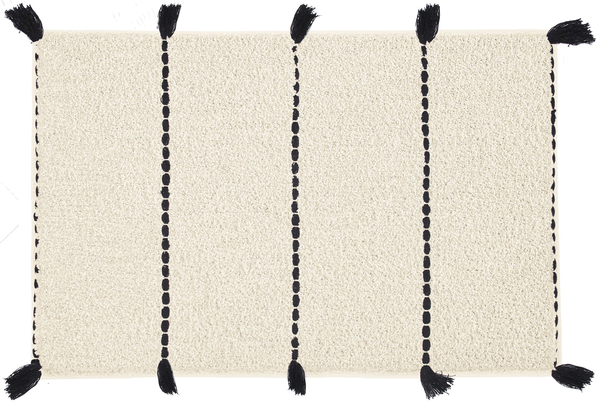 Badteppich TRAVIS Natur 55 x 65 cm liegt flach mit schwarzen Quasten auf hellem Hintergrund.