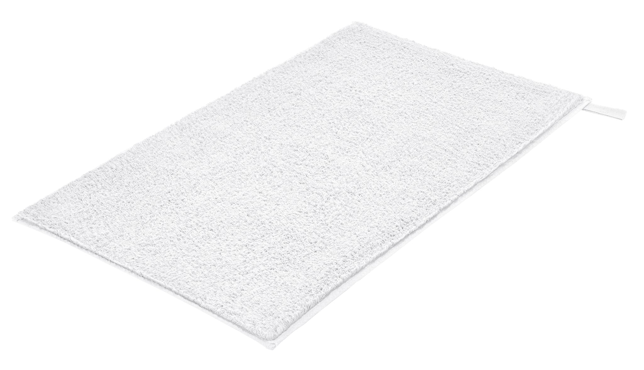 Badteppich VITA Weiß 50 x 80 cm liegt rechteckig auf hellem Untergrund.