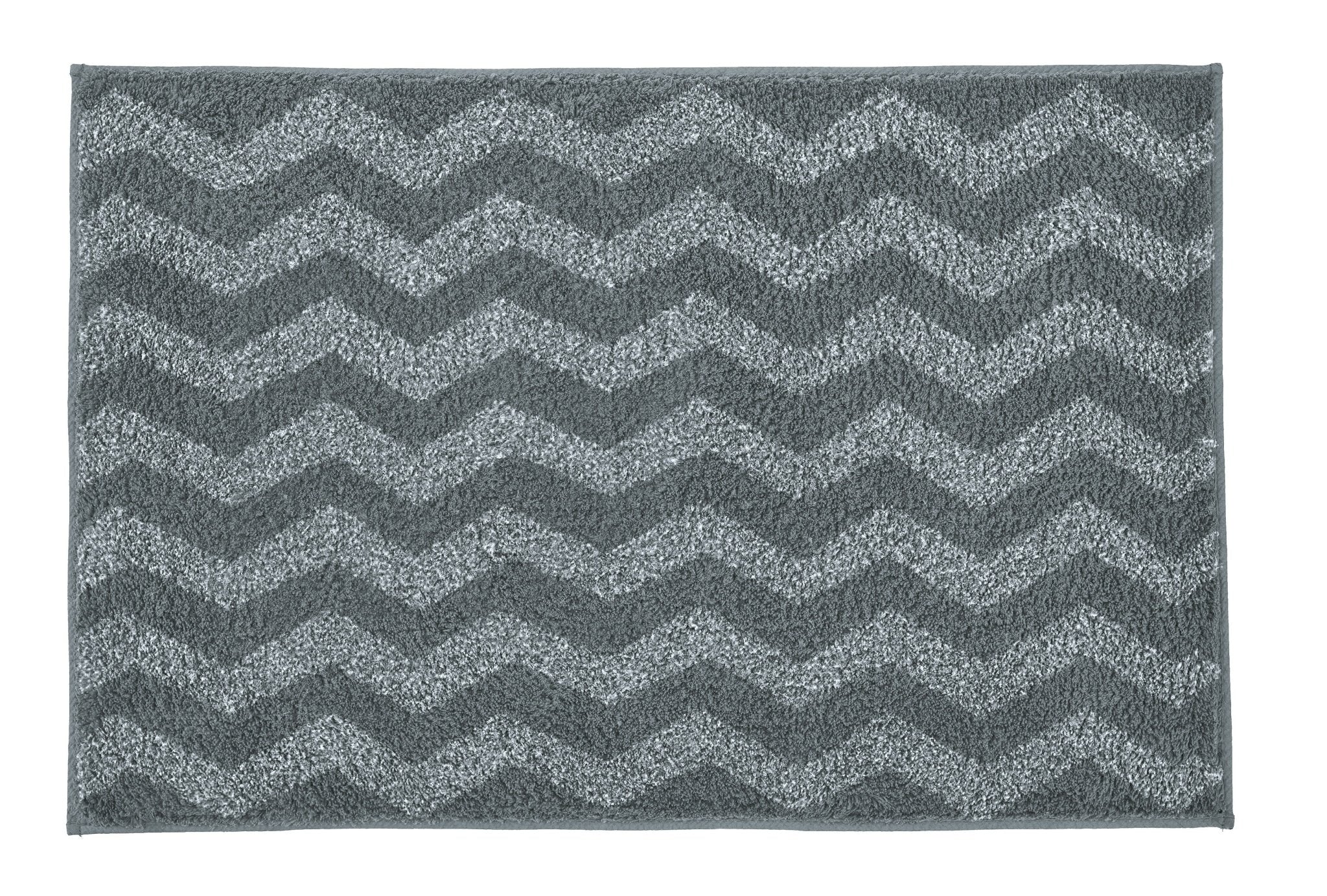 Badteppich ZACK Schiefer 60x90 cm mit grauem Zickzackmuster liegt flach ausgebreitet.