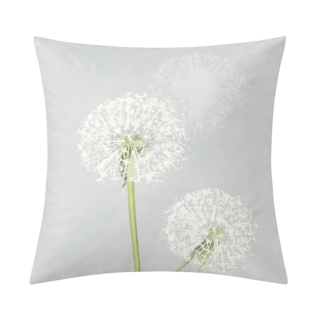 Grauer Kopfkissenüberzug mit weißem Pusteblumenmotiv.