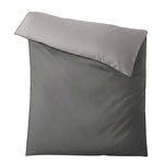 Einfarbige Bettwäsche in Grau mit schlichtem, modernem Design.