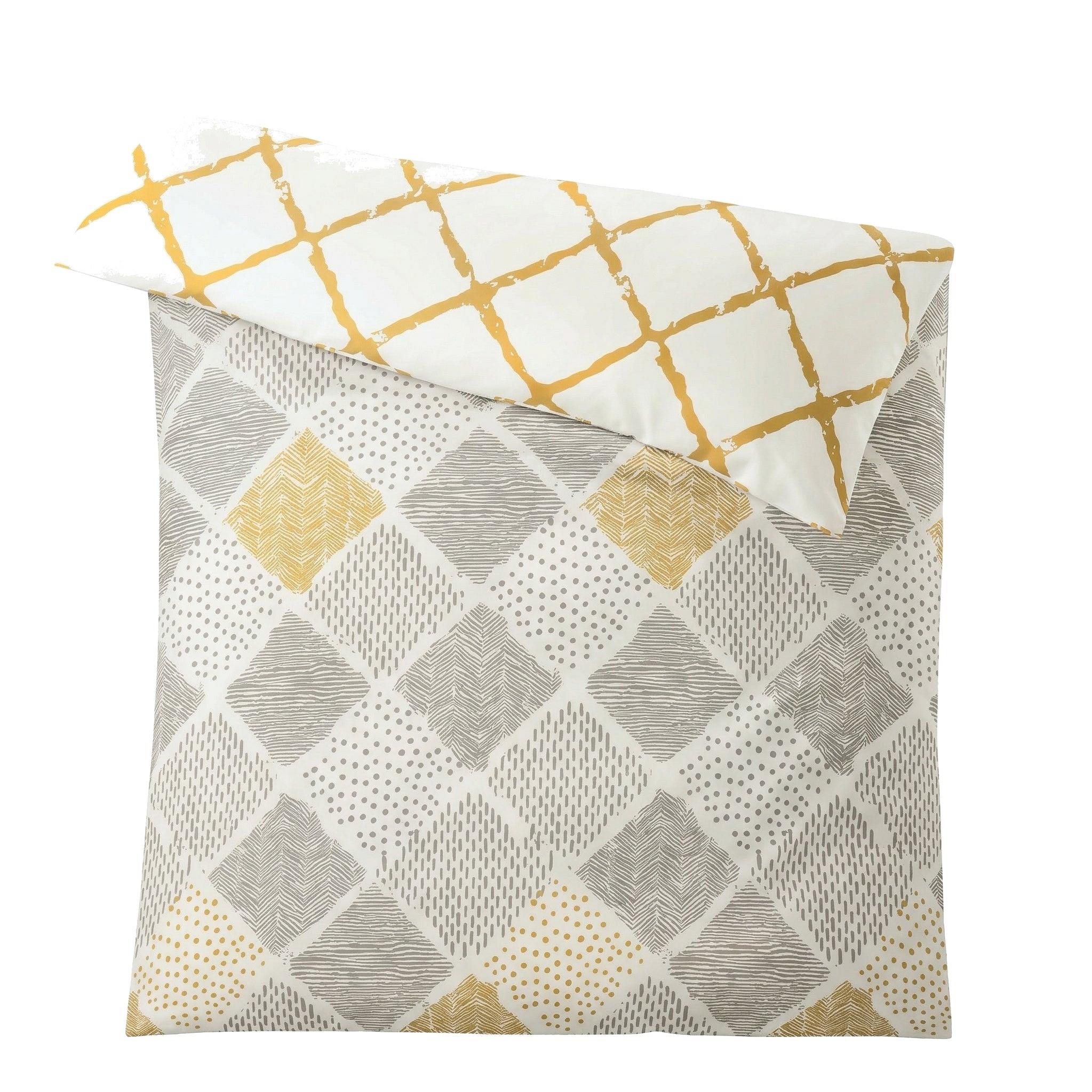 Weiße Bettwäsche mit grauen und gelben Rauten, Wendendesign.