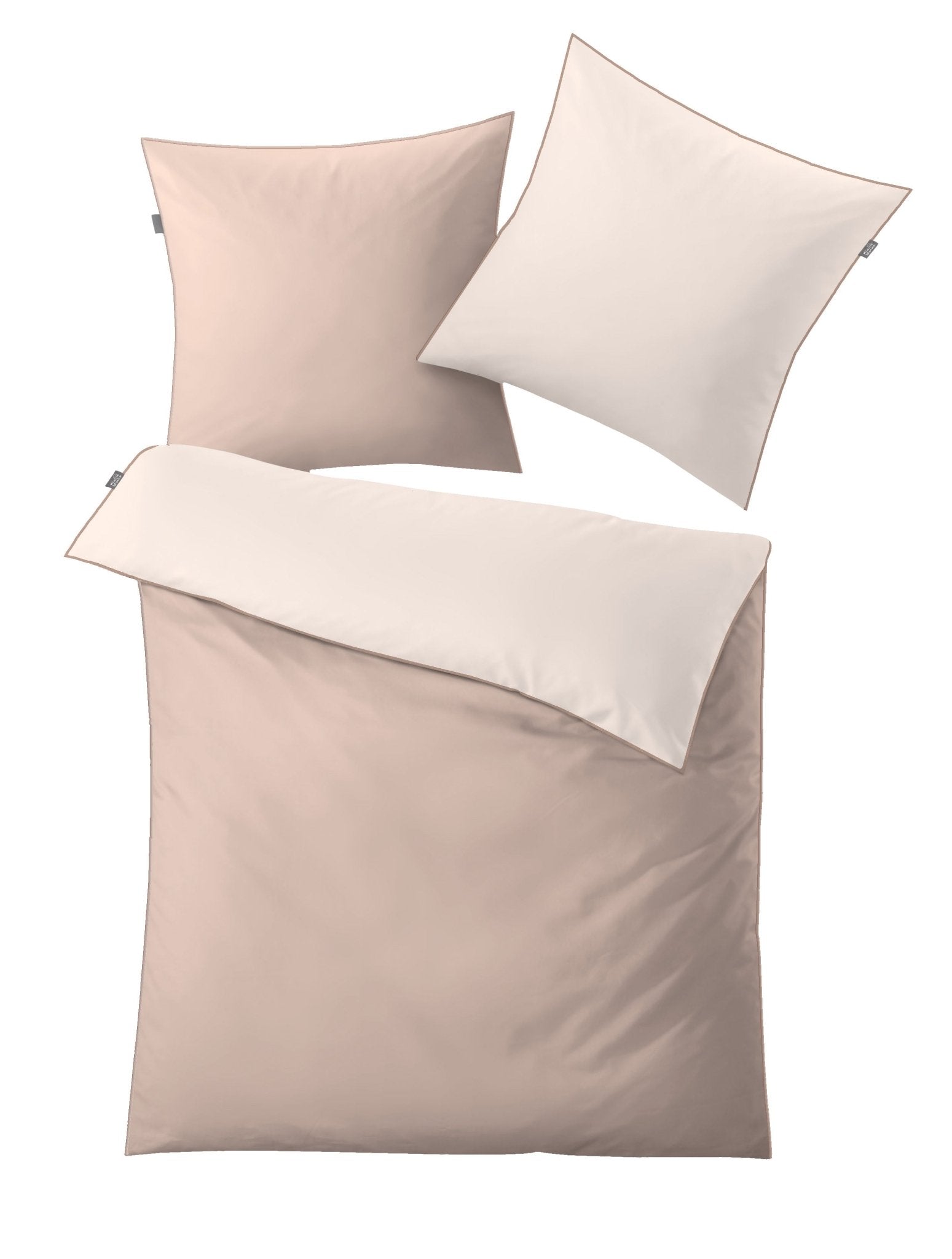 Bettwäsche Satin LINDA Taupe 155x220 und 80x80 mit Wendeoptik in Taupe und Creme ist aufgefaltet dargestellt.