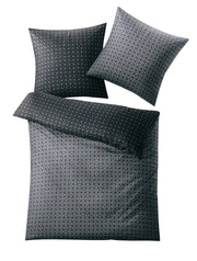 Dunkelgraue Bettwäsche mit grafischem Webmuster, Kissen und Decke
