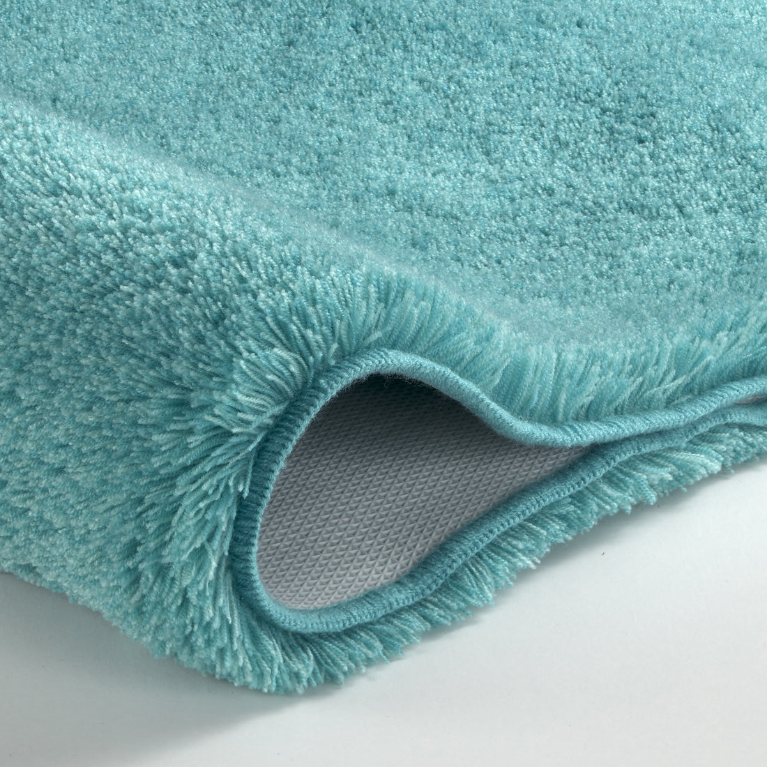 Türkiser Kleine Wolke Creatico Badteppich Relax 672 mit weichem Flor und rutschfester Rückseite.