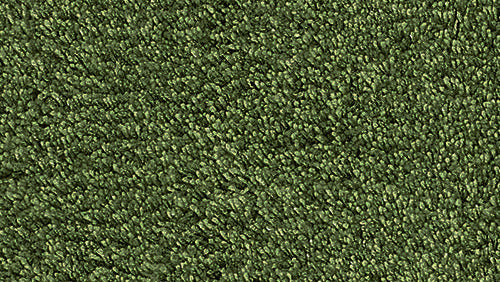 Der kleine Wolke Creativo Badteppich Relax Forest wird in grüner Nahaufnahme gezeigt.