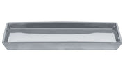 Rechteckige Dekoschale GLAMOUR in Silberfarben liegt leer auf hellem Untergrund.
